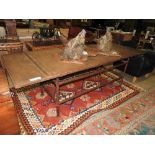 An Industrial/ contemporary dining kitchen table the rectangular rust effect top with strapwork