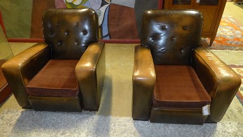 A pair of 1930s French tanned leather club armchairs, the spring backs over brown velour upholstered
