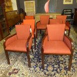 A set of seven mid 20th Century dining chairs, the red upholstered seats over hardwood showframes