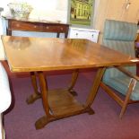 A Regency design mehogany oval tray top on lyre pedestal base