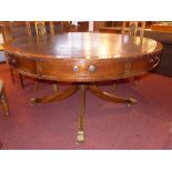 A Victorian style mahogany drum table, t
