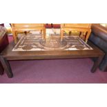 A 1970's Danish oak low table inset with