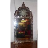 A 19th century Venetian wall mirror with bevelled plate and cut glass etched details (a/f)