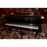 A Challen ebonised baby grand piano, serial number; 47025, recently restored and tuned.