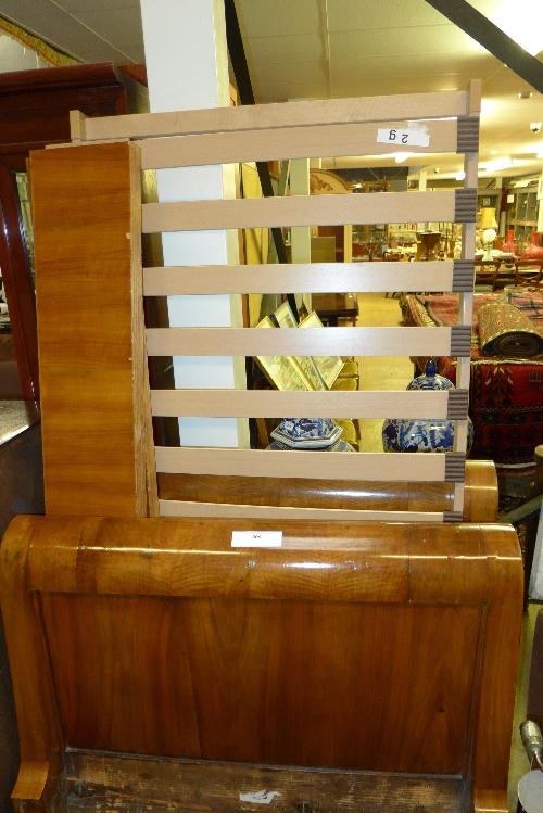 A 19th century French walnut single lit en bateau with siderails and slats 
W 106cm x H 96cm x L