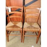 A set of six antique style farmhouse pine chairs with rush seats