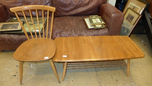 An Ercol vintage retro coffee table with undertier 35cm x 106cm and an Ercol chair (2)