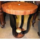 A pair of 20th century Art Deco style lamp tables the circular veneered tops over ebonised