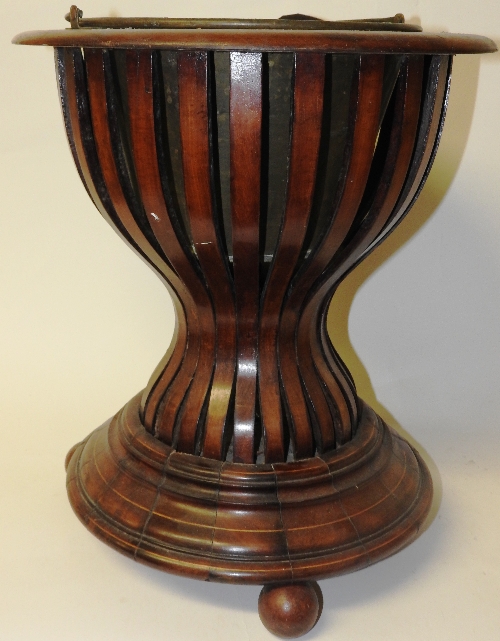 An early 20th Dutch mahogany and inlaid jardiniere,