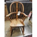 A C20th pine child's rocking chair D 42cm x H 62cm