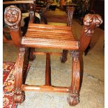 A pair of late of 19th century French carved walnut stools,