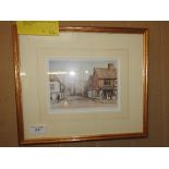 A pair of limited edition prints of town scenes in gilt frames by S. Francis. 35cm x 30cm .