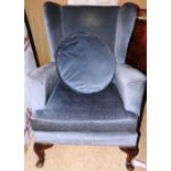 An early 20th century Georgian design wingback armchair,