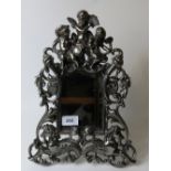 A Cherub and winged horse easel mirror.