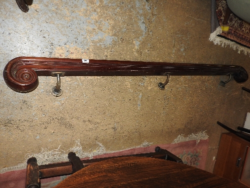 An Edwardian mahogany hand rail in Grecian style