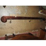 An Edwardian mahogany hand rail in Grecian style