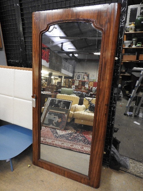 A Victorian mahogany mirrored door with original plate