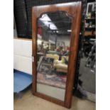 A Victorian mahogany mirrored door with original plate