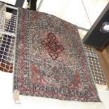 An Indo Persian silk rug,