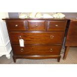 A 20th century stag mahogany chest of three short over two long drawers on long bracket supports W