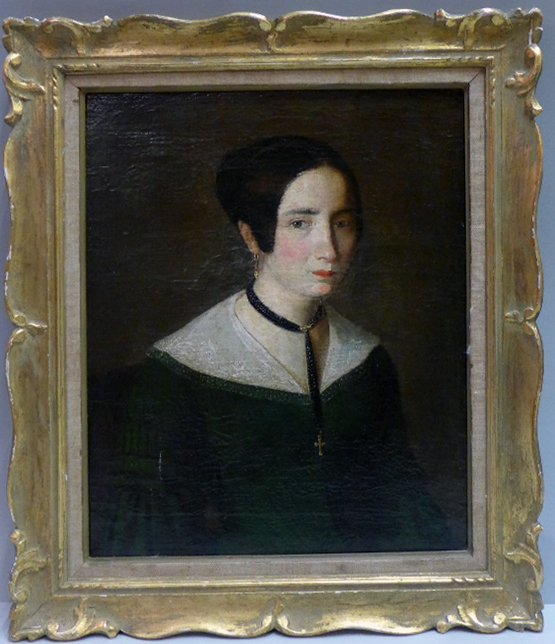 A 19th Century unsigned oil on canvas of a Victorian lady in a green dress and cross necklace, - Image 2 of 2