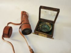 A 20th century walnut Spencer and Co magnifying glass,