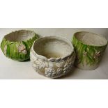 A collection of three pottery floral vases