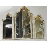 A French style triple plate cream painted and parcel gilt dressing mirror.