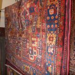 A fine North West Persian Nahavand carpet having a central pendant medallion with repeating