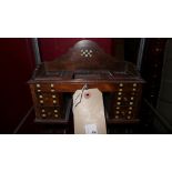 A Victorian apprentice piece chest together with a pedestal desk form inlaid rosewood desk tidy