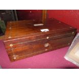 A Victorian rosewood and mother of pearl inlaid writing slope with fitted interior.