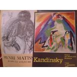 Three art exhibition posters: Magritte, Kandinsky, and Matisse.