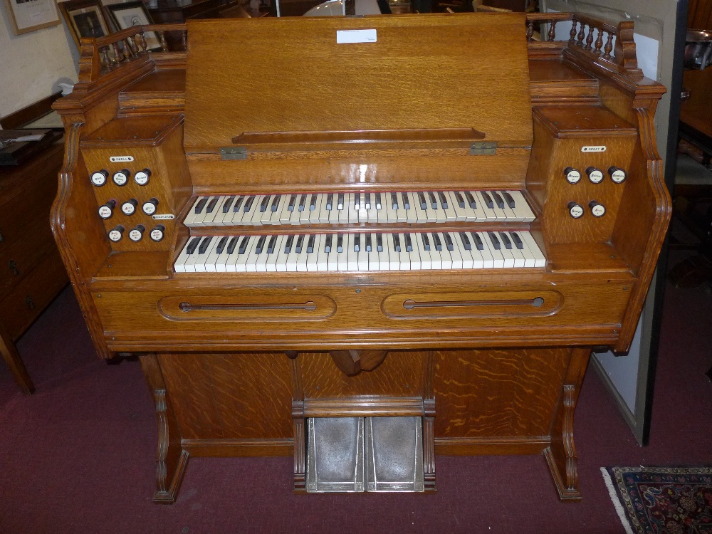 An antique oak reed organ