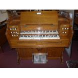 An antique oak reed organ