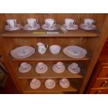 A Queen Anne 'Harvest Pink' pattern porcelain tea service.