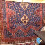 An extremely fine northwest Persian Afshar rug with triple diamond shaped medallion with reading