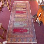 A hand made Turkish prayer rug with palmettes and floral decoration