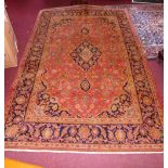 An extremely fine central Persian Kashan rug with pendant medallion in rouge field surrounded by