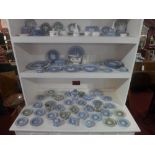 A large collection of Wedgwood items, mainly Jasperware, including vases, trinket boxes, plates,