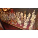 A very large collection of figures including some in the Lladro style, Continental figures, and