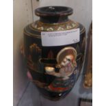 WITHDRAWN A pair of Japanese vases glazed dark blue and having figural detail in relief.