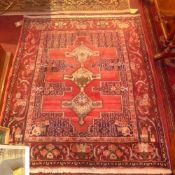 An extremely fine northwest Persian Senneh rug with a chain linked diamond shaped central