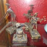 A group of four Barbadian wirework figurines of musicians.