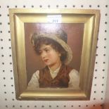 A late 19th century oil painting of a boy, signed and dated 'E. Wright 1893', in a gilt frame.