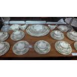 An extensive Grindley 'Creampetal' pattern dinner service including meat platters and tureens
