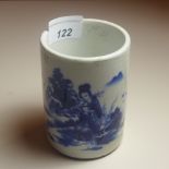 A Chinese blue and white porcelain brush pot decorated with a girl in landscape.