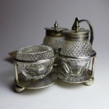 A hallmarked silver and cut glass cruet