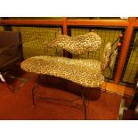 A 1950s chaise longue of smaller proport