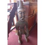 An African carved hardwood Bangwa statue.