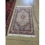 A handmade Kashmir carpet made from wool and silk,